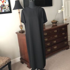 Women’s beautiful black dress by Henry Lee. Size 14. Excellent Condition